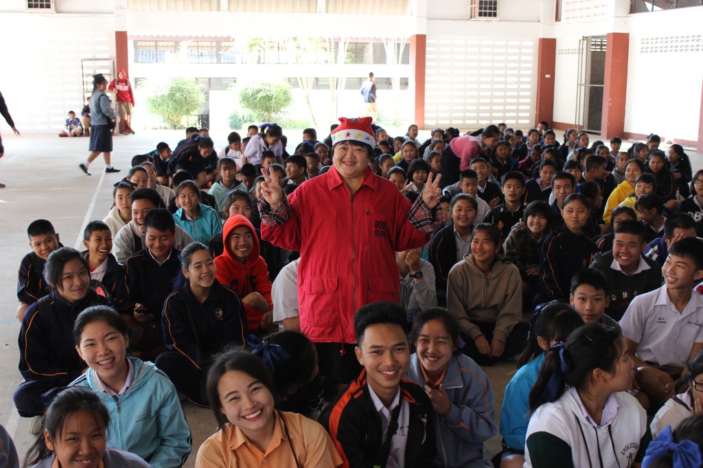 One of the nicest Thai teachers - Kru (Teacher) Tu - with the students. 